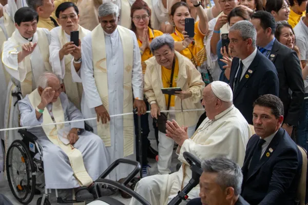 Pope Francis greets elderly priests before the start of Mass. Credit: Daniel Ibáñez/ EWTN News