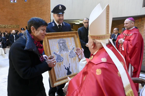 They give the Pope a painting that represents Christ the Savior. Credit: Vatican Media