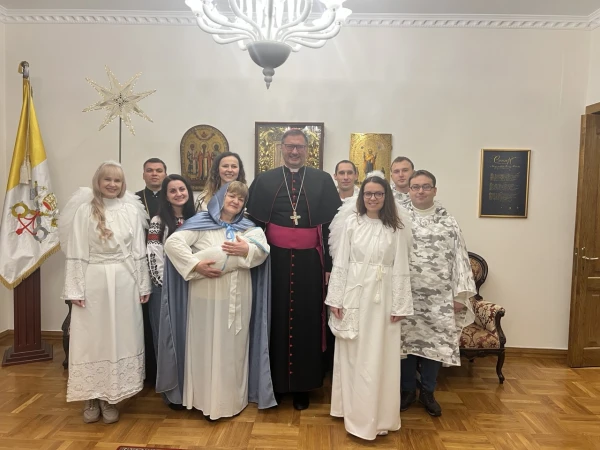 Mons. Kubokas with faithful who made the living birth in the Nunciature. Credit: assigned by the Nuncio