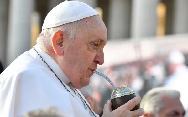 Pope Francis drinks mate offered to him by a pilgrim during a General Audience. Credit: Vatican Media