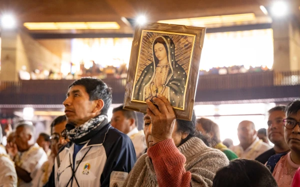 Woman with an image of the Virgin of Guadalupe. Credit: Basilica of Guadalupe