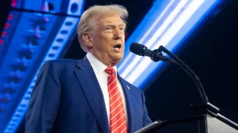 El presidente electo Donald Trump habla durante el AmericaFest de Turning Point USA en el Centro de Convenciones de Phoenix el 22 de diciembre de 2024, en Phoenix.