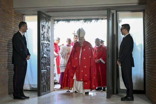 Pope Francis walks through the Holy Door of Rebibbia. Credit: Vatican Media