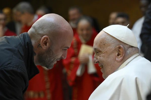 One of the inmates greets Pope Francis. Credit: Vatican Media