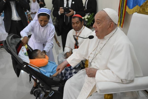 Pope Francis shakes hands with little Silvano. Credit: Vatican News