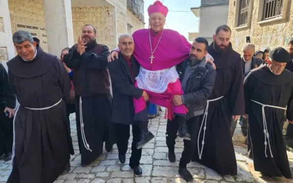 Bishop Hanna Jallouf is warmly received in his hometown and parish (Al-Qaniya, rural Idlib, Syria). Credit: CTS.