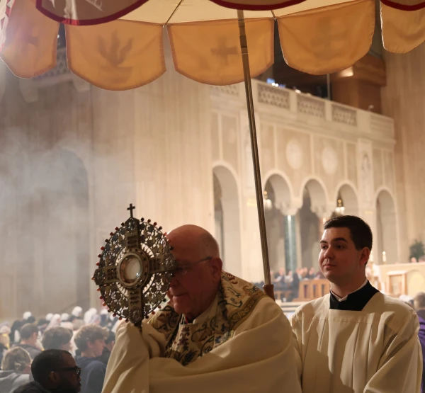 The Archbishop of Kansas City, Bishop Joseph Fred Naumann, walked in procession through the halls of the upper church of the basilica with the Blessed Sacrament and presided over the adoration. Credit: Courtesy of the Basilica of the National Shrine of the Immaculate Conception.