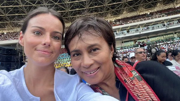 Socorro Vázquez with an Indonesian woman during Pope Francis' Mass in Jakarta. Credit: Courtesy