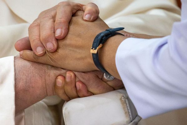 Nun shakes hands with the Holy Father. Credit: Daniel Ibáñez/ EWTN News